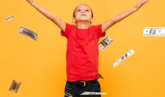 concentrated-little-boy-child-money_171337-3112